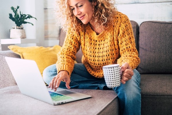 Person using laptop at home